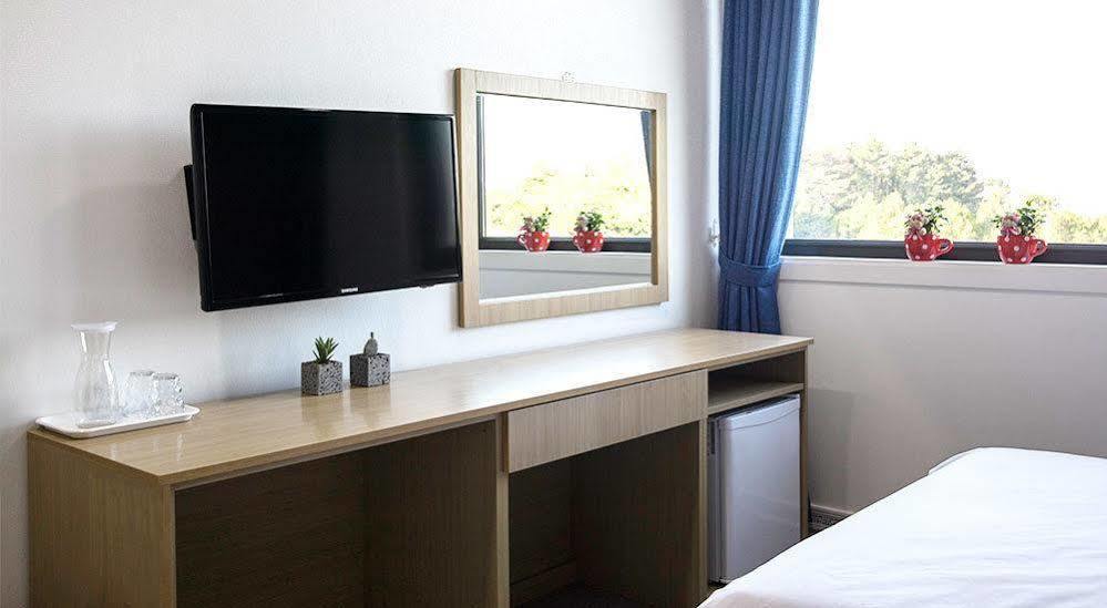 Ra Tourist Hotel Чеджудо Экстерьер фото